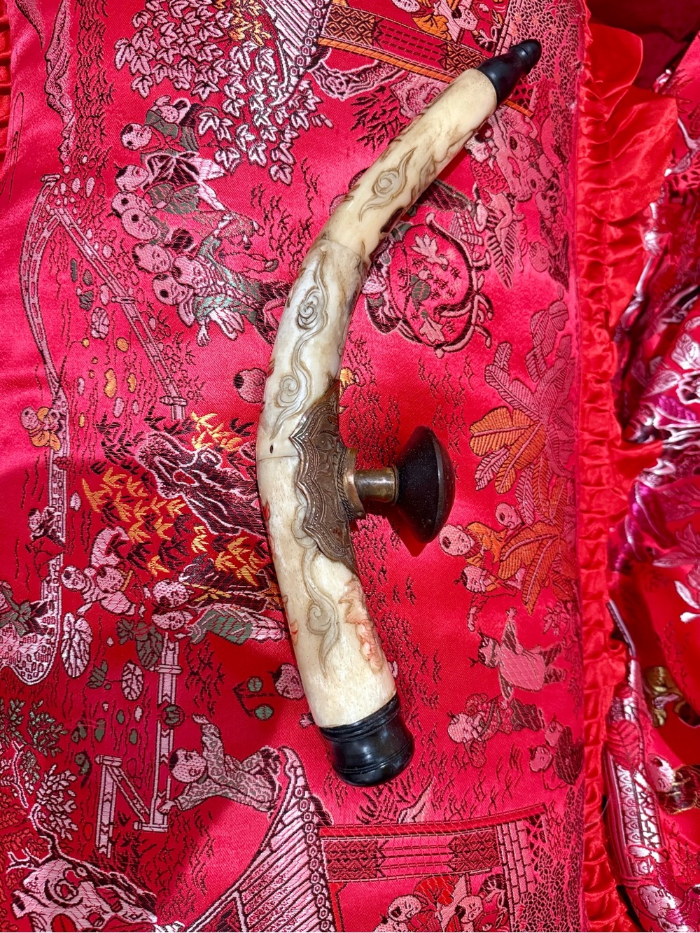 Carved bone antique with Ornate Metal Mount